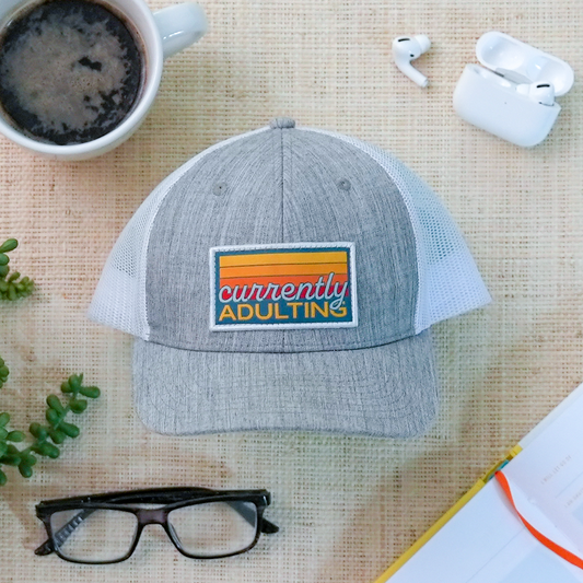 Currently Adulting Trucker Hat